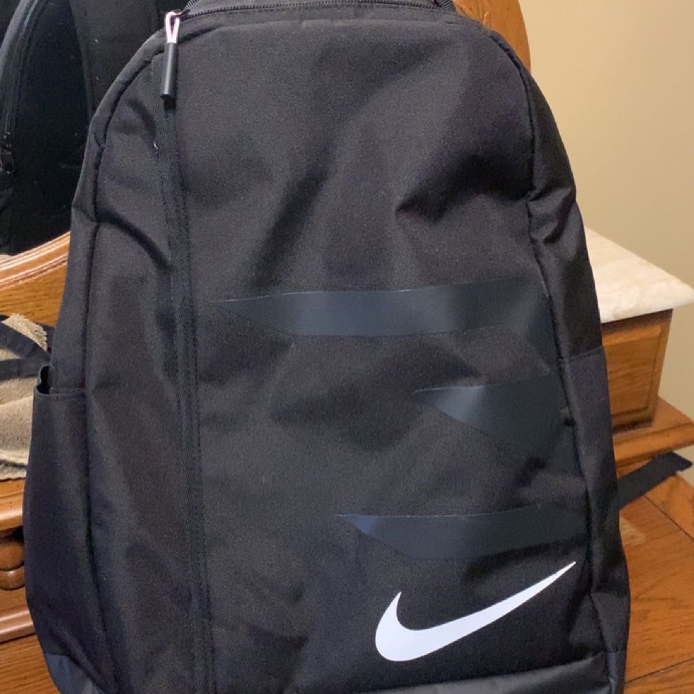 Nike Black Backpack with Durable Fabric and Streamlined Design